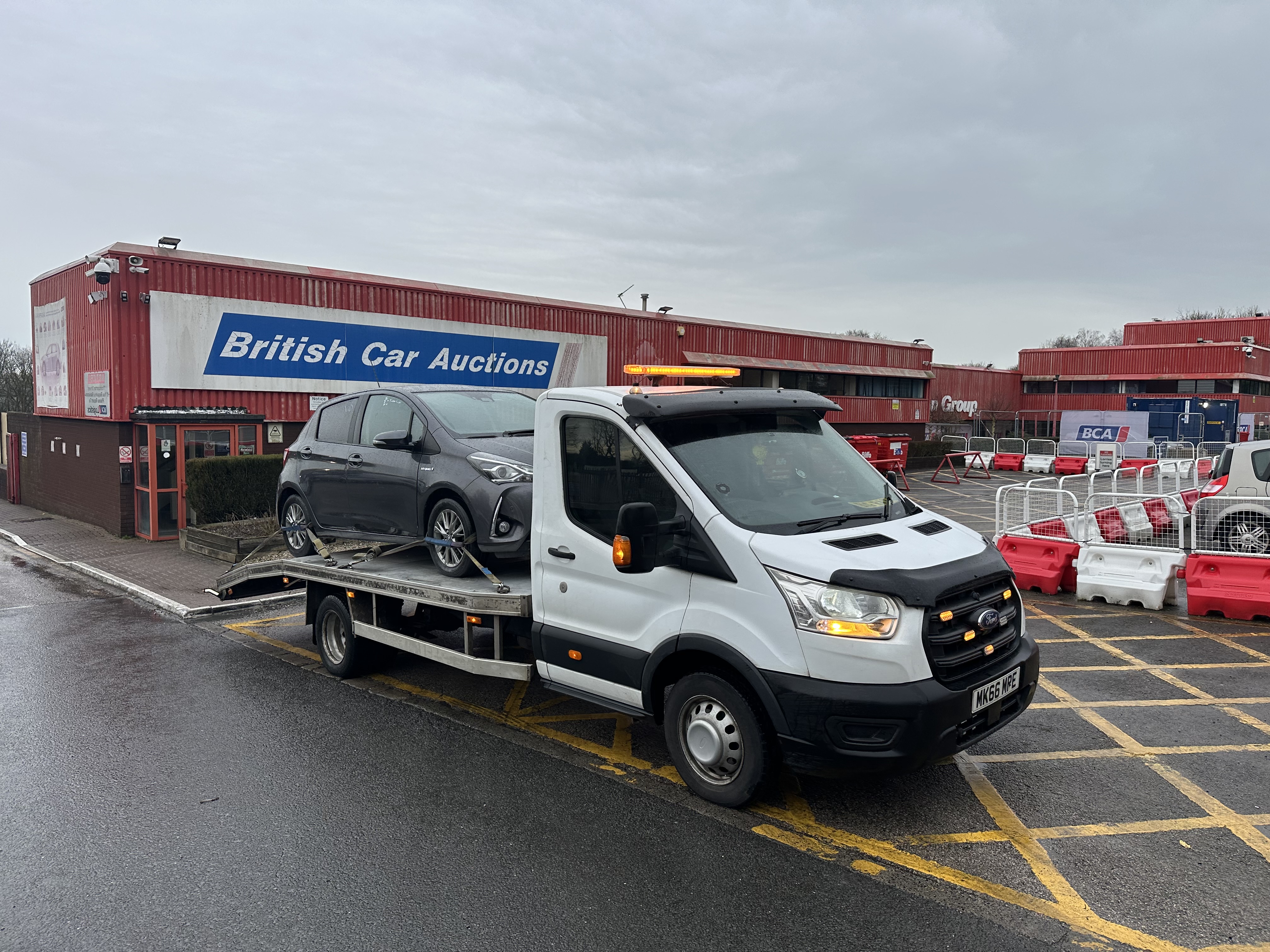 Big Ray Car Recovery truck loading a vehicle